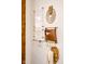 Stylized wall decor with clear calendar, leather magazine rack and wooden decorative pieces on a white wall at 6012 N 200 W, Greenfield, IN 46140