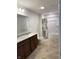 Bright bathroom featuring a double sink vanity, shower-tub combo and modern fixtures at 614 Corbin Way, Avon, IN 46123
