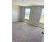 Bedroom featuring plush carpeting and ample natural light from two windows at 614 Corbin Way, Avon, IN 46123