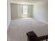 Large bonus room with neutral carpet, bright window, and neutral walls at 614 Corbin Way, Avon, IN 46123