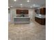 Spacious kitchen with stainless steel appliances and tile flooring at 614 Corbin Way, Avon, IN 46123