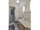 Tidy bathroom featuring a shower with glass doors, a toilet, and a clean vanity at 618 Mellowood Dr, Indianapolis, IN 46217