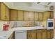 Kitchen with ample counter space and a view of the backyard at 618 Mellowood Dr, Indianapolis, IN 46217