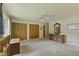 Spacious main bedroom with ample closet space, neutral carpet, and dresser at 618 Mellowood Dr, Indianapolis, IN 46217