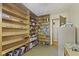 Office space featuring built in bookshelves and natural light at 618 Mellowood Dr, Indianapolis, IN 46217
