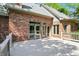 Spacious back deck with railing of a beautiful brick house with sliding glass doors at 6183 Whitetail Run, Greenwood, IN 46143