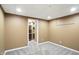 Unfinished basement space with carpet and paint, offering storage and potential for customization at 6183 Whitetail Run, Greenwood, IN 46143