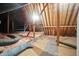 Unfinished attic featuring exposed beams, pink insulation, and ductwork at 6183 Whitetail Run, Greenwood, IN 46143