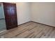 Bedroom featuring hardwood floors and neutral paint at 624 Warren Ave, Indianapolis, IN 46221