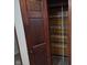 View of walk-in pantry with stained wood trim and multiple wire storage shelves at 624 Warren Ave, Indianapolis, IN 46221