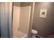 Bathroom with standard toilet, and shower/tub combination, and a framed print to add personality at 6422 Hollingsworth Dr, Indianapolis, IN 46268
