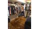 Walk-in closet providing ample storage with organized shelving and hanging rods for clothing at 6422 Hollingsworth Dr, Indianapolis, IN 46268