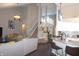 Open floor plan connecting the living room, kitchen, and staircase with contemporary furnishings at 6422 Hollingsworth Dr, Indianapolis, IN 46268