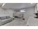 Finished basement with bunkbeds, a mini kitchenette, a comfortable couch, and gray accents at 6497 Osprey Dr, Nineveh, IN 46164