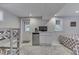 Finished basement with bunk beds, kitchenette, exterior access, and plenty of natural light at 6497 Osprey Dr, Nineveh, IN 46164