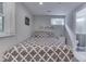 Simple bedroom design providing both comfort and access to the adjoining bathroom at 6497 Osprey Dr, Nineveh, IN 46164