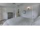 Bedroom with neutral walls and flooring showcasing a light gray bedspread and a gray wooden dresser at 6497 Osprey Dr, Nineveh, IN 46164