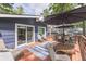 Relaxing outdoor space featuring dining set, lounge chairs and a private view at 6497 Osprey Dr, Nineveh, IN 46164