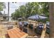 Cozy outdoor area with comfortable seating, dining table, and picturesque water views at 6497 Osprey Dr, Nineveh, IN 46164