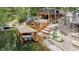 Beautiful lake house featuring a private boat dock, a wooden deck, and a wooded lot at 6497 Osprey Dr, Nineveh, IN 46164