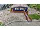Charming home with a wooden walkway and gravel yard, surrounded by lush greenery at 6497 Osprey Dr, Nineveh, IN 46164