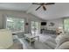 Bright living room with vaulted ceiling and access to the outdoor deck at 6497 Osprey Dr, Nineveh, IN 46164