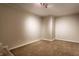 Unfinished basement featuring neutral colored walls and carpet, ready to be customized at 6556 Reserve Dr, Indianapolis, IN 46220
