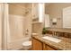 Well-maintained bathroom with a shower-tub combo, granite countertop, and modern fixtures at 6556 Reserve Dr, Indianapolis, IN 46220