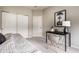 Cozy bedroom features a closet, workspace, and modern design elements at 6556 Reserve Dr, Indianapolis, IN 46220