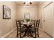 The dining room features modern lighting and is set for a meal, creating a comfortable and welcoming atmosphere at 6556 Reserve Dr, Indianapolis, IN 46220