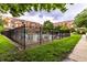 Community pool area with lounge seating and fencing at 6556 Reserve Dr, Indianapolis, IN 46220