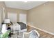 Bedroom featuring a desk, closet and neutral tones at 6640 Page Blvd # 101, Indianapolis, IN 46220