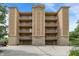 Condominium exterior featuring covered parking and upper-level balconies, perfect for relaxation at 6640 Page Blvd # 101, Indianapolis, IN 46220
