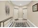 Inviting hallway featuring a decorative rug and neutral paint tones, offering a warm welcome at 6640 Page Blvd # 101, Indianapolis, IN 46220