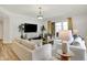 Inviting living room featuring modern furnishings and sliding glass doors to a private balcony at 6640 Page Blvd # 101, Indianapolis, IN 46220
