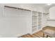 A spacious walk-in closet with built-in shelving and hanging rods offers ample storage at 6640 Page Blvd # 101, Indianapolis, IN 46220