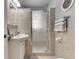 Neutral bathroom with a shower, vanity, sink and tile floors at 6649 Madison Ave, Indianapolis, IN 46227
