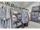 Walk-in closet featuring wire shelving and hanging rods for clothing and shoes at 6649 Madison Ave, Indianapolis, IN 46227