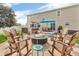 Backyard patio area with seating, outdoor furniture, a hot tub, and a manicured lawn at 7047 Lancaster Ln, Avon, IN 46123