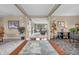 Spacious foyer with hardwood floors, decorative rug, and views into other living spaces at 7047 Lancaster Ln, Avon, IN 46123