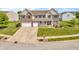 Beautiful two-story home with a well-manicured lawn, two-car garage, and inviting front porch at 7047 Lancaster Ln, Avon, IN 46123