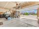 Open garage featuring ample storage space, bicycles, and a view of the neighborhood at 7047 Lancaster Ln, Avon, IN 46123
