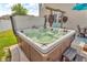Relaxing backyard hot tub with built-in seating, perfect for unwinding after a long day at 7047 Lancaster Ln, Avon, IN 46123