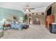 Spacious main bedroom with lots of natural light, with hardwood floors and a ceiling fan at 7047 Lancaster Ln, Avon, IN 46123