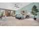Spacious main bedroom with lots of natural light, with hardwood floors and a ceiling fan at 7047 Lancaster Ln, Avon, IN 46123