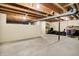 Unfinished basement ready for customization, offering exposed beams and duct work at 7215 Braxton Dr, Noblesville, IN 46062