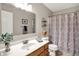 Bathroom featuring nice vanity, mirror, lighting, and shower/bath combo with neutral decor at 7215 Braxton Dr, Noblesville, IN 46062