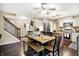 Open-concept kitchen and dining space features granite countertops, modern appliances, and a breakfast nook at 7215 Braxton Dr, Noblesville, IN 46062