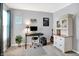 Well-lit home office with desk, chair, and storage cabinet for a productive workspace at 7215 Braxton Dr, Noblesville, IN 46062