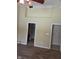 Bedroom featuring plush carpeting, with two entry doors and a high ceiling at 7440 Oakview Dr, Avon, IN 46123